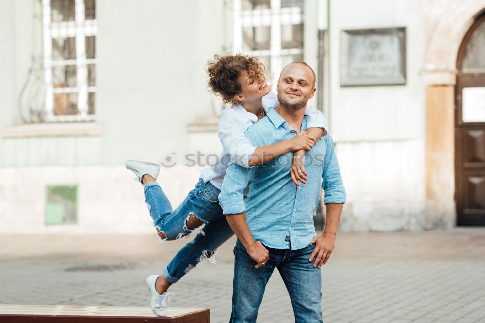 Similar – Smiling couple of lovers having fun.