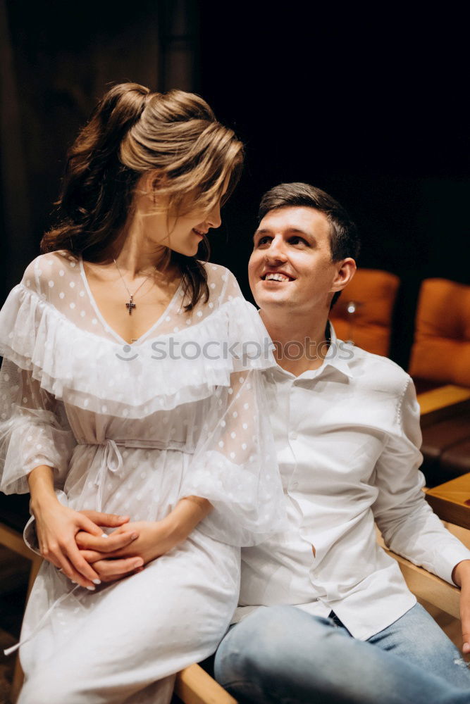 Similar – Image, Stock Photo Couple embracing on evening street