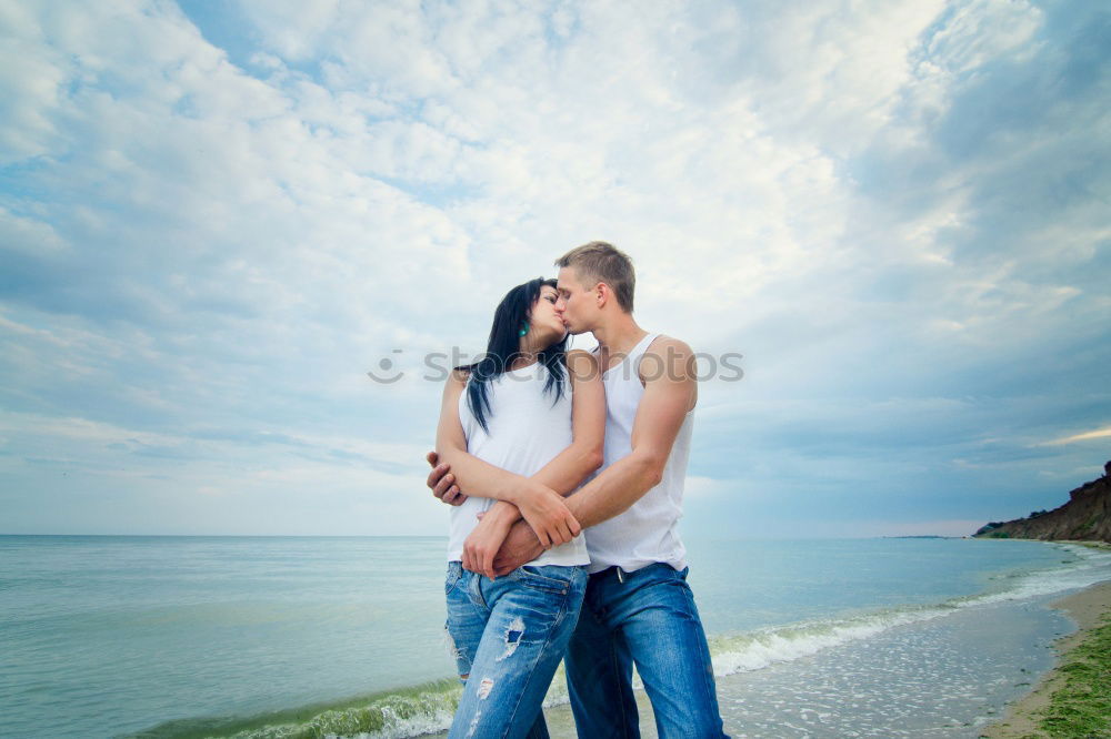 Similar – Image, Stock Photo Two adults training on the beach together