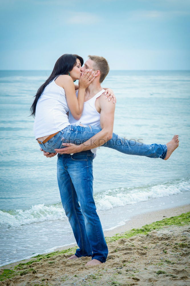 Similar – Image, Stock Photo Fitness couple kissing on the beach