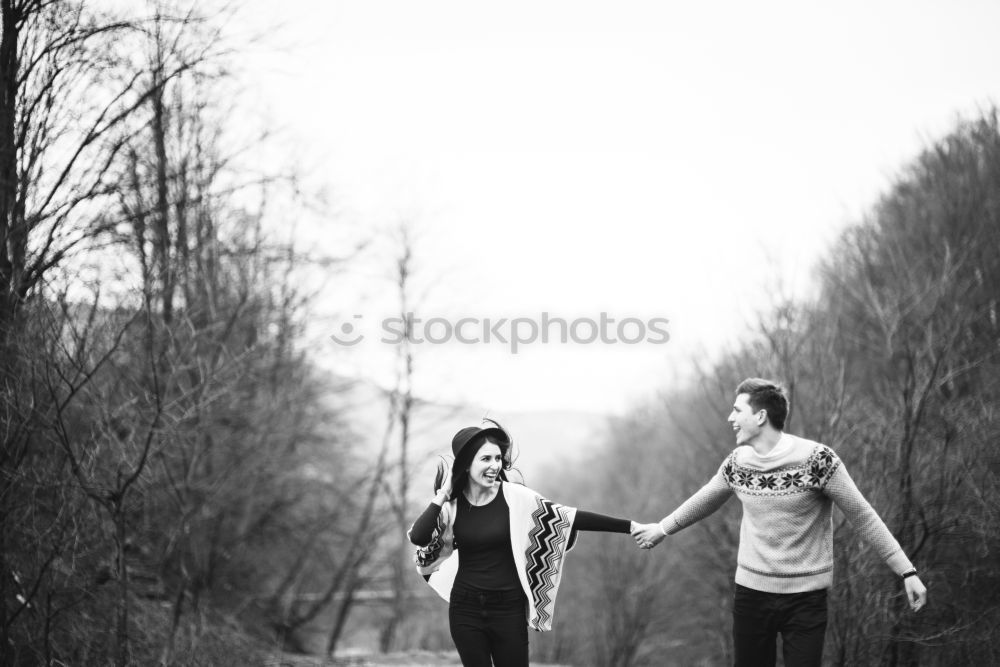 Similar – Image, Stock Photo Couple of young hugging and shouting