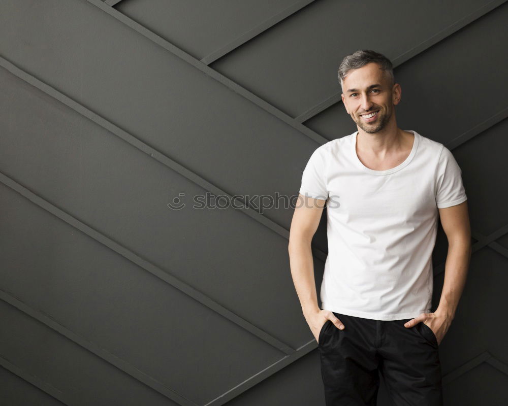 Similar – Man sitting in a bench on a beautiful maroon background