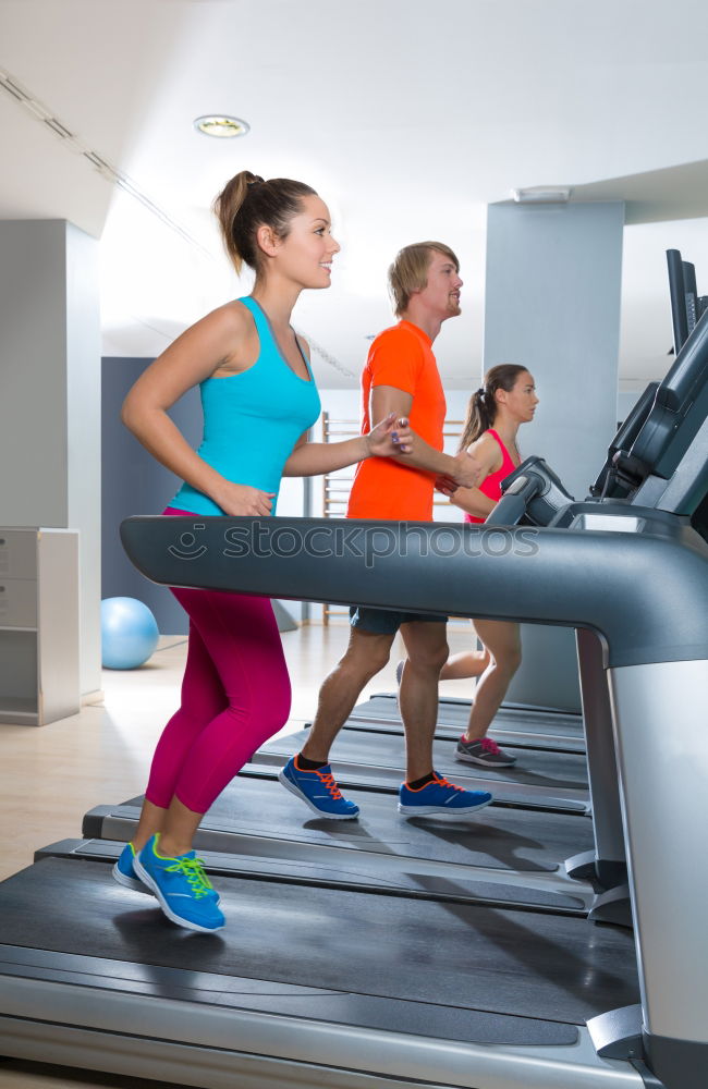 Similar – Image, Stock Photo People running over treadmill in a training session