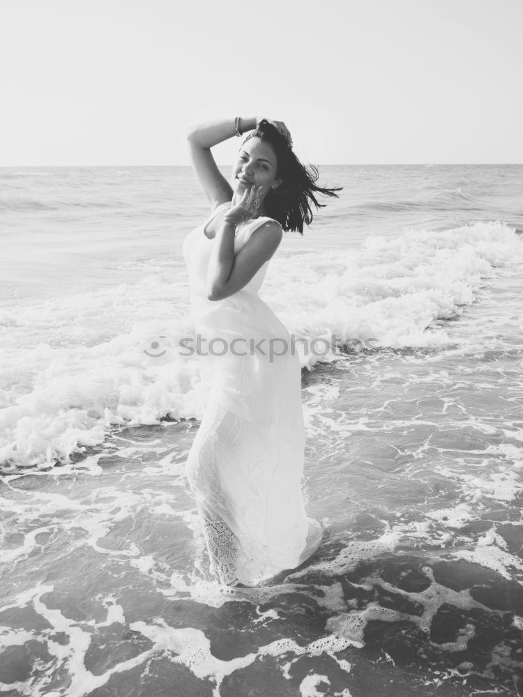 Similar – Image, Stock Photo Young adult couple kissing on beach after running workout