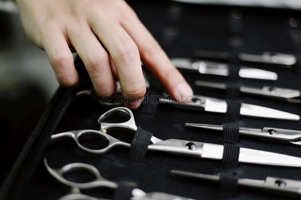 Similar – Image, Stock Photo Mechanic repairing customized motorcycle