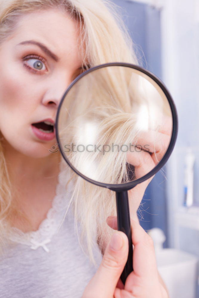 Similar – Image, Stock Photo Young woman looking at herself in a mirror