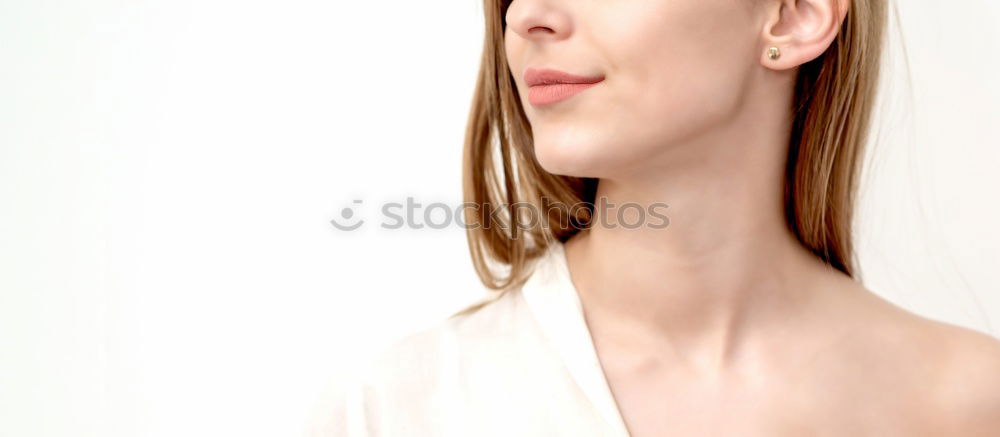 Image, Stock Photo Portrait of smiling young woman in front of white wall