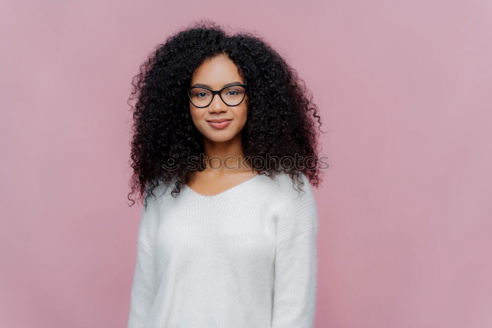 Similar – Image, Stock Photo Mixed woman with afro hairstyle standing in an urban park
