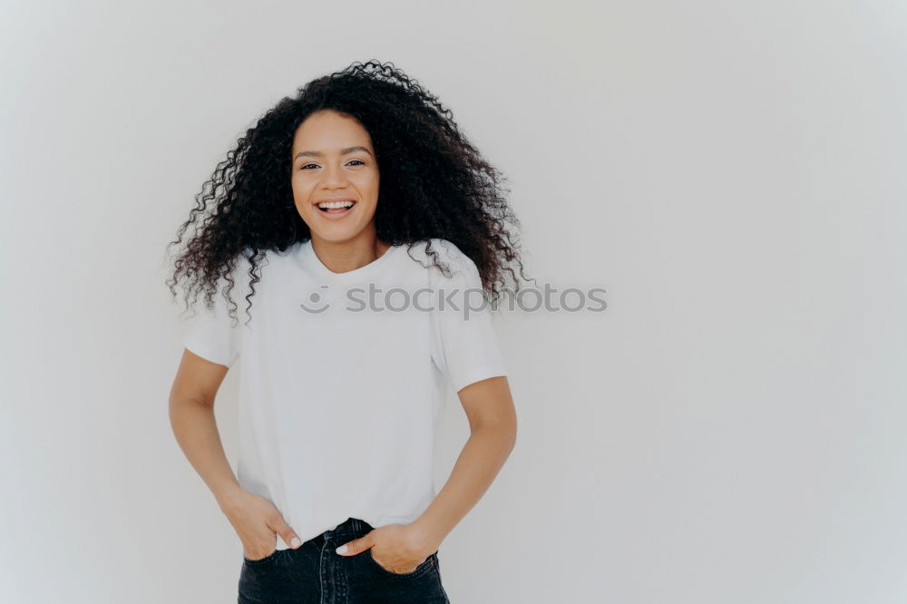 Similar – close up of a pretty black woman with curly hair smiling and lying on bed looking away