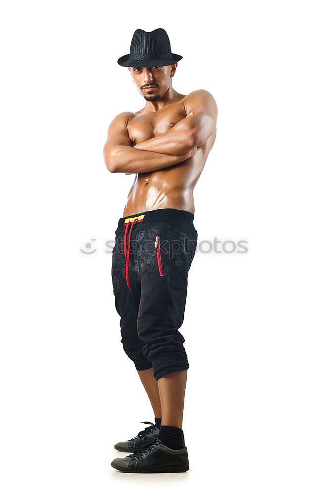 Similar – Fit shirtless young black man doing legs stretching