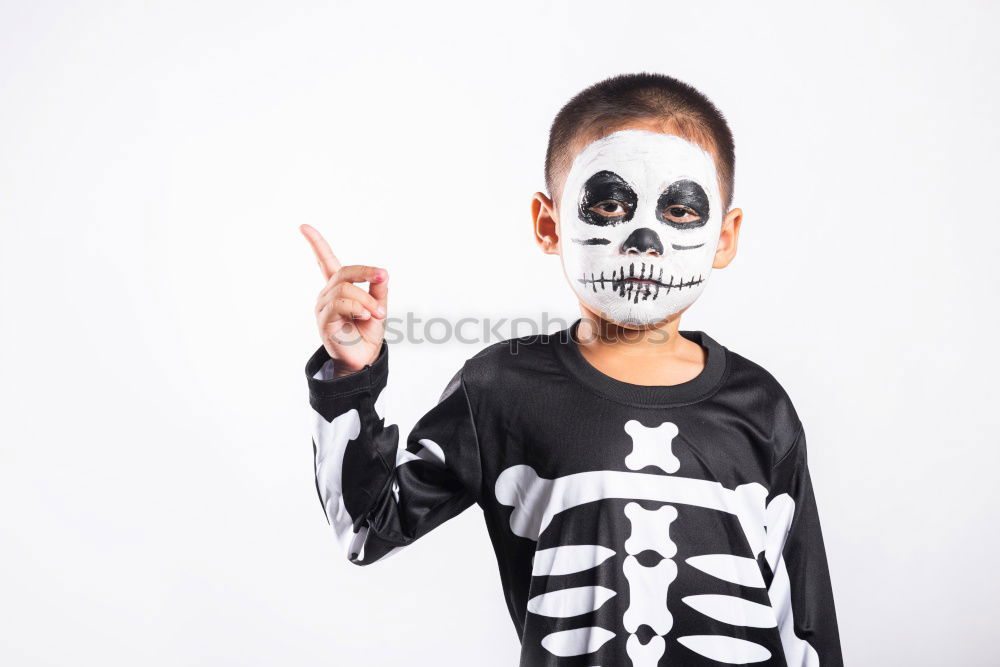 Similar – Little kid in a skeleton costume on Halloween Carnival