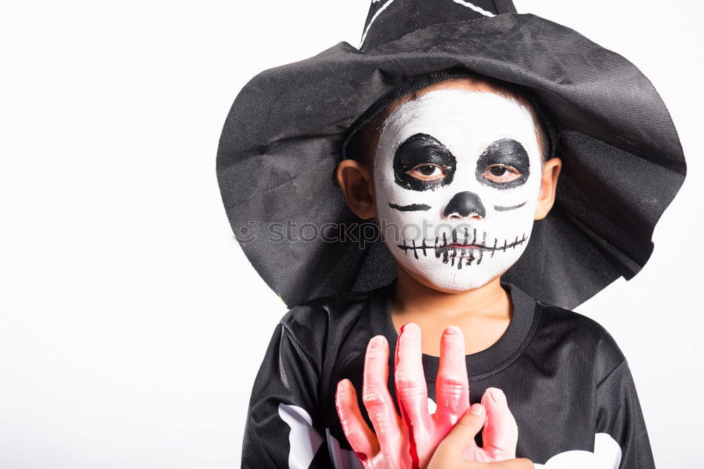 Similar – Little kid in a skeleton costume on Halloween Carnival