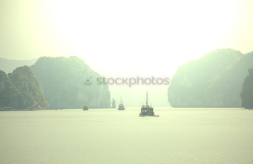 Image, Stock Photo Sunrise behind boat in Ha Long Bay, Vietnam