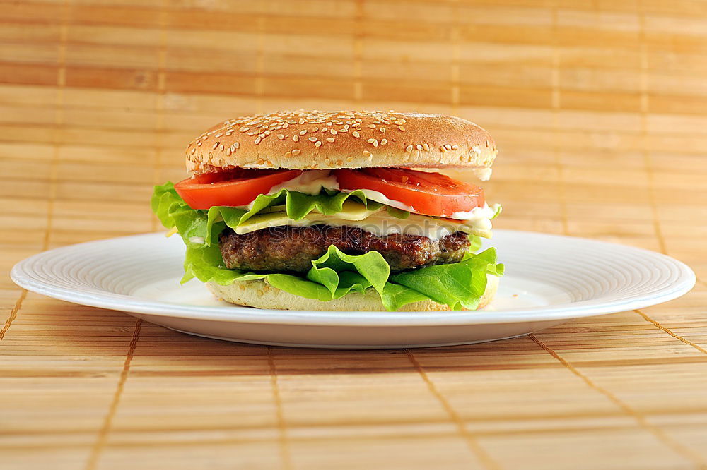 Similar – Image, Stock Photo burger with a meatball and vegetables