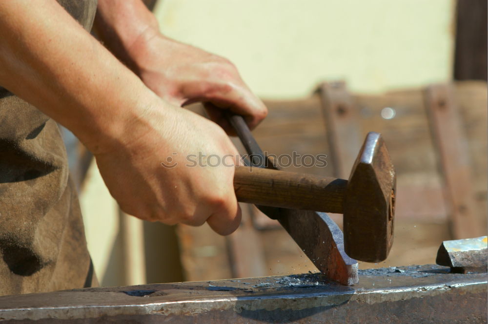 Similar – Image, Stock Photo Carpenter works with a chisel and a hammer.