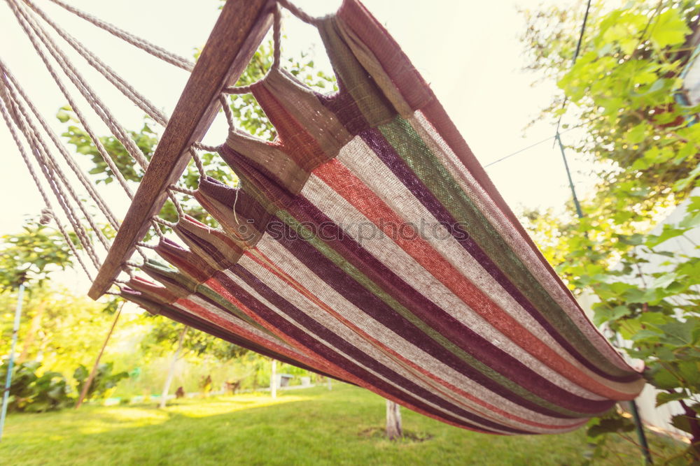 Similar – Man legs on the hammock