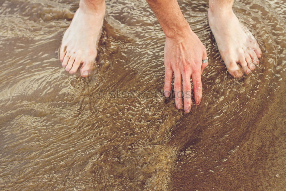 Similar – Starfish and feet on the beach