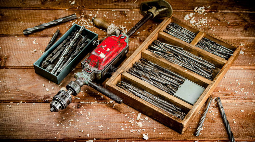 Similar – Top view of different goldsmiths tools on the jewelry workplace.