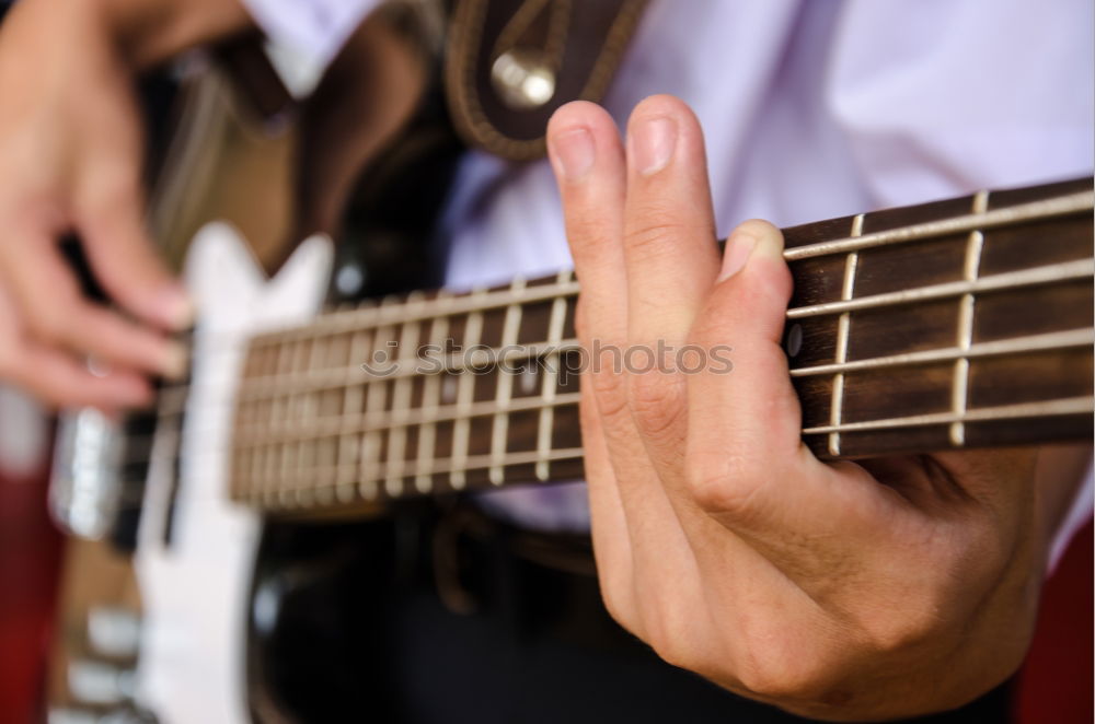 Similar – Man playing electric guitar