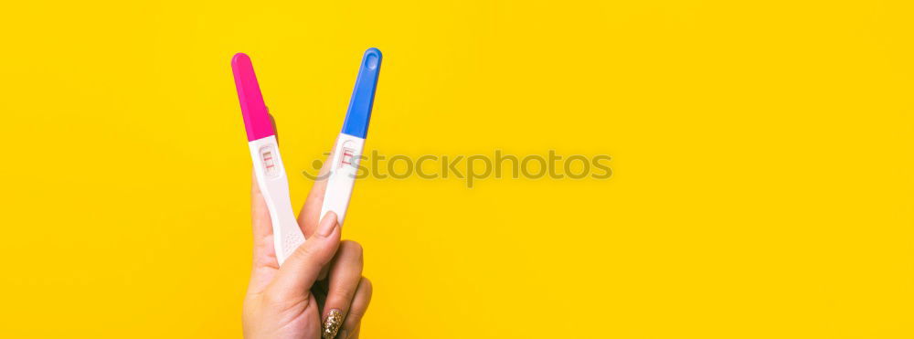 Similar – Image, Stock Photo Forearm and hand with pencil against a yellow background