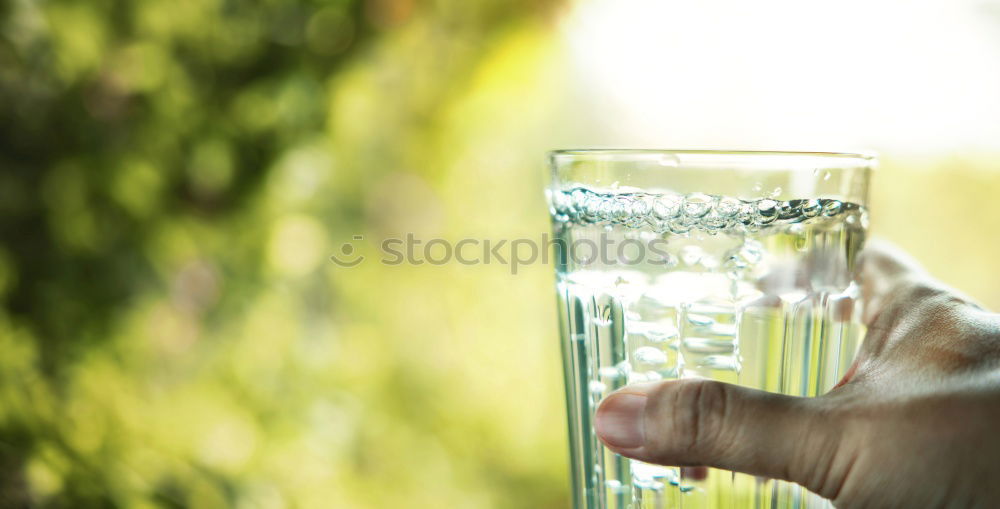 Similar – Image, Stock Photo Hand hold very small cup of coffee.