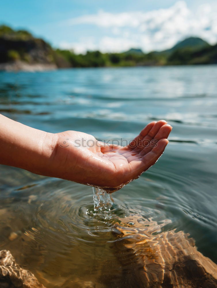 Similar – Barefoot on stones