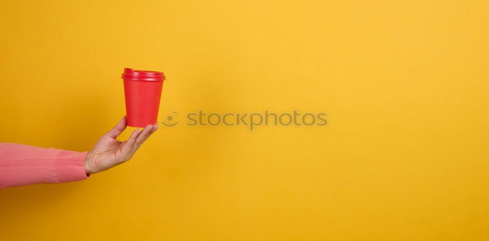 Similar – Image, Stock Photo Forearm and hand with pencil against a yellow background