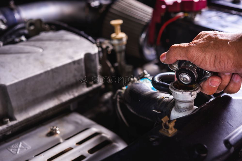 Similar – Man working on bike in shop