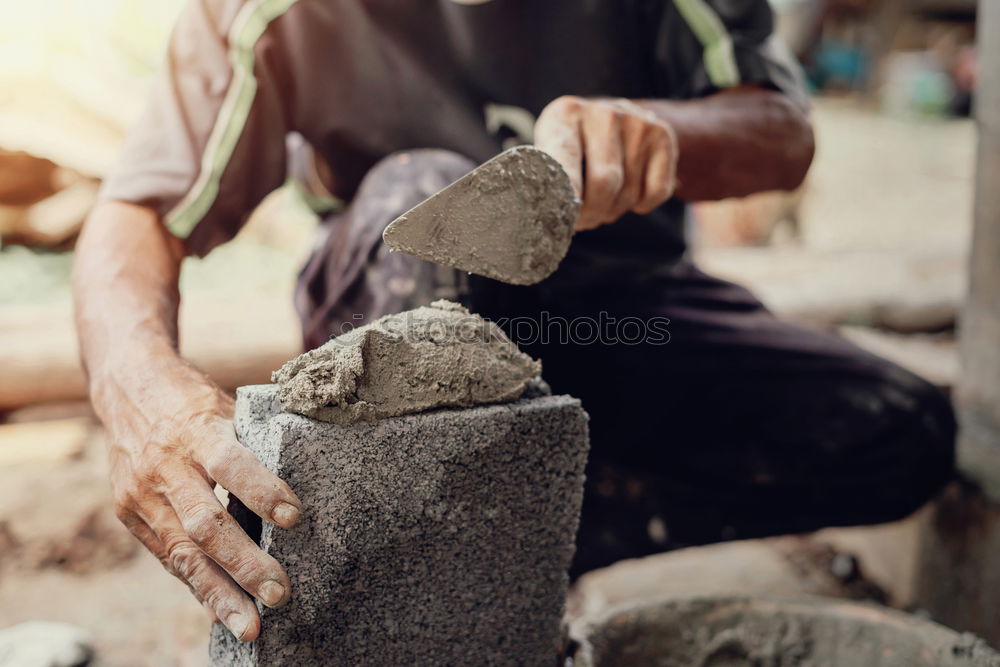 Carving stone, craftsman shaping stone