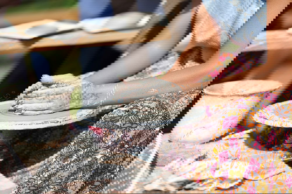 Similar – Image, Stock Photo Hand playing yoga bowls outdoors.