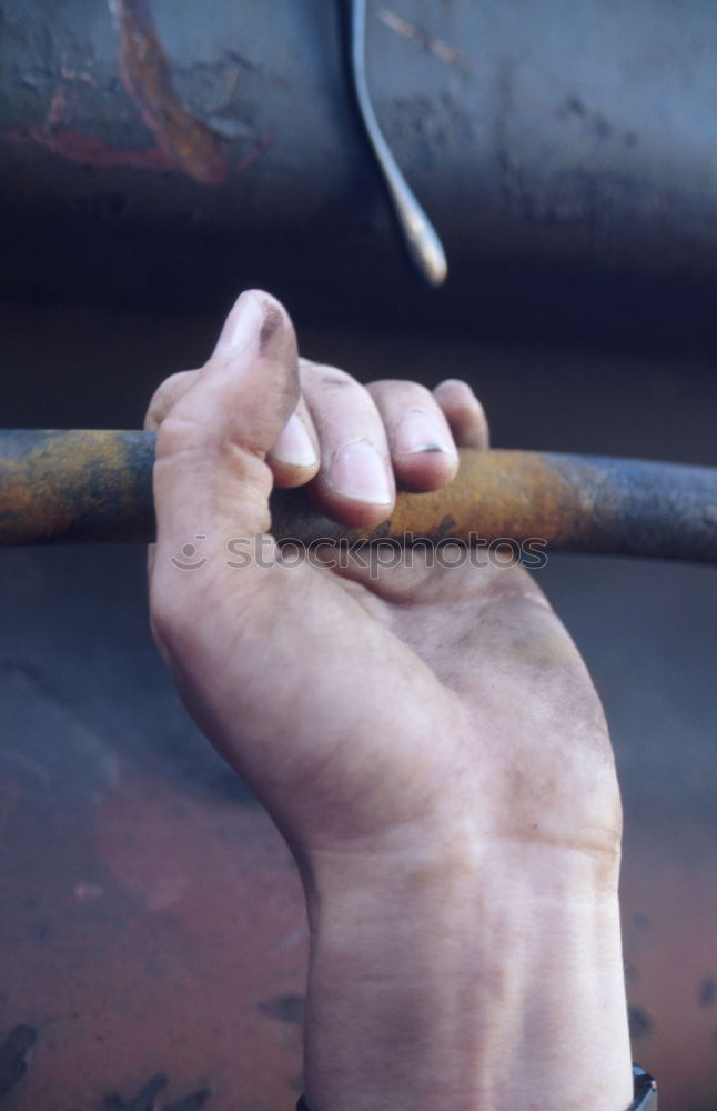 Similar – Image, Stock Photo Man holding motorcycle chains