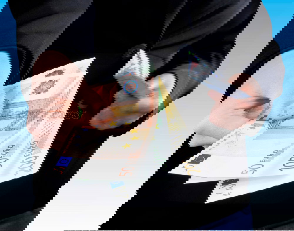 Similar – Image, Stock Photo Payday | hands of a young woman and many banknotes standing on the table before her.