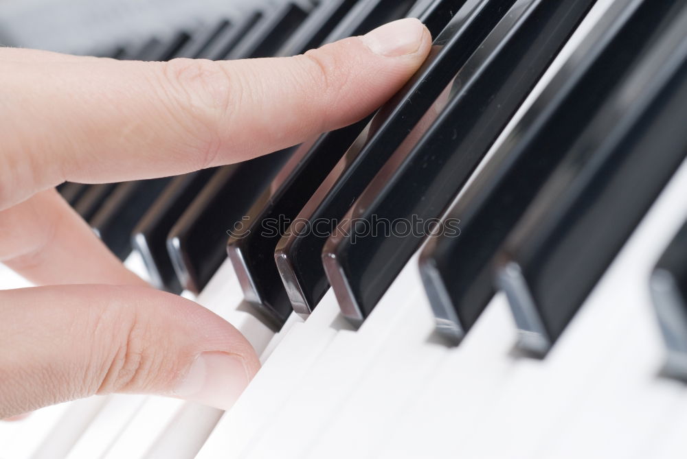 Similar – Image, Stock Photo Close up of hands of person playing piano