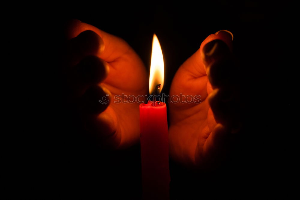 Similar – Image, Stock Photo Two candles glow in the dark. Sadness, hope, comfort, faith