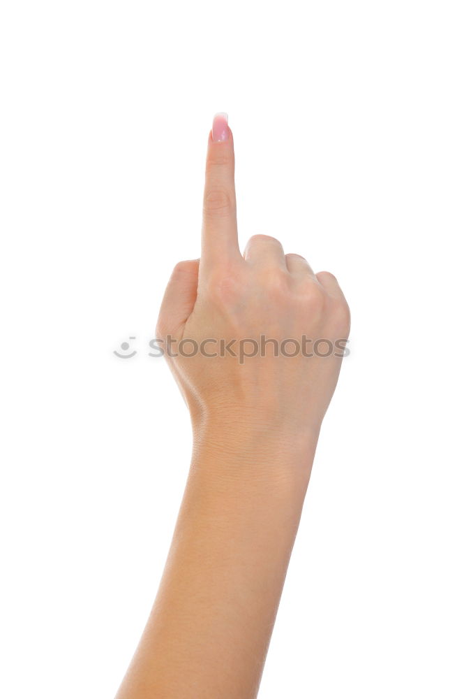 Similar – Forearm, hand and index finger against a yellow background