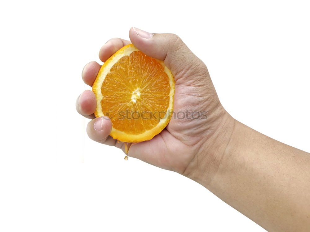 Similar – hands holding a natural orange