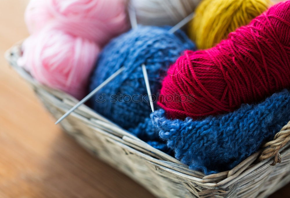 Similar – colourful washcloths hang in a row from the heating in the bathroom