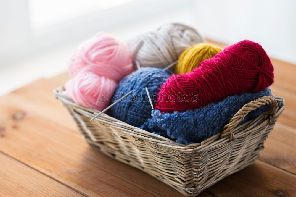 Similar – colourful washcloths hang in a row from the heating in the bathroom