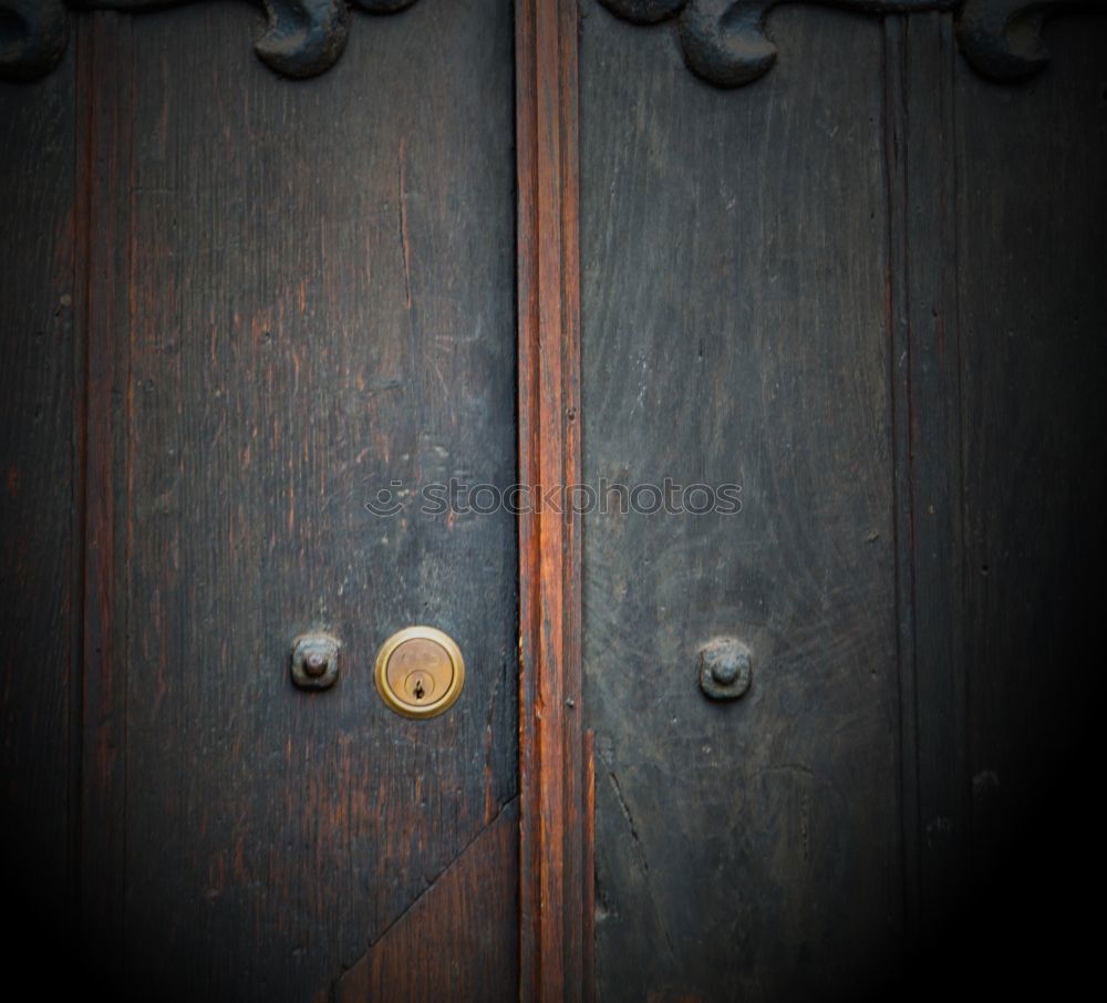 Similar – House number 37 on a dark wooden front door with crooked hook