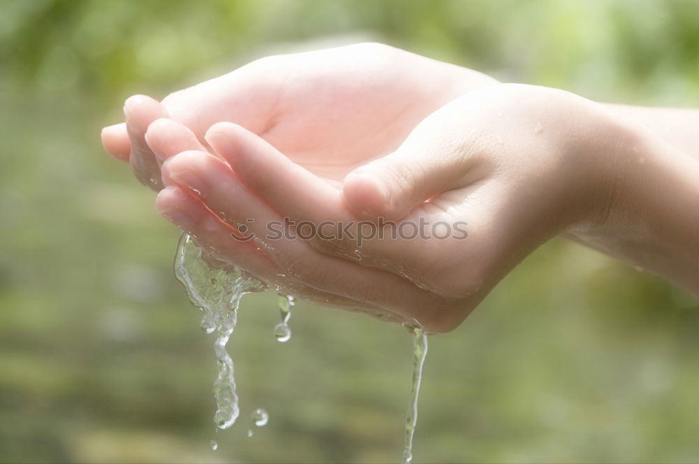 Similar – Image, Stock Photo Hand hold very small cup of coffee.