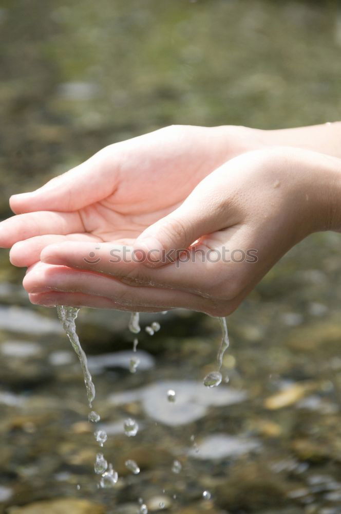 Similar – Image, Stock Photo Hand touching fresh water in a lake