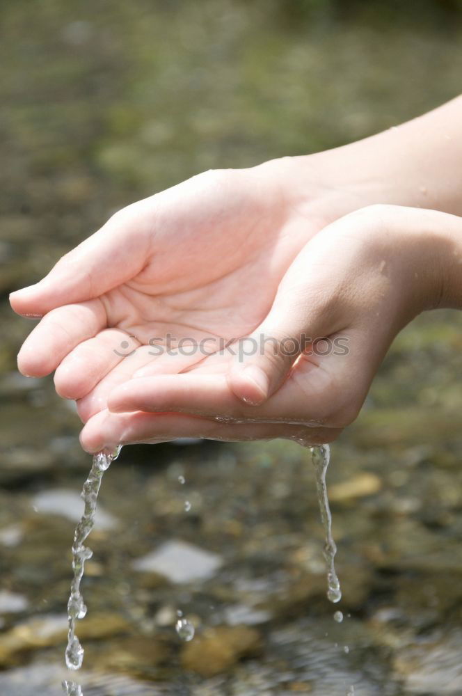 Similar – Image, Stock Photo Hand touching fresh water in a lake