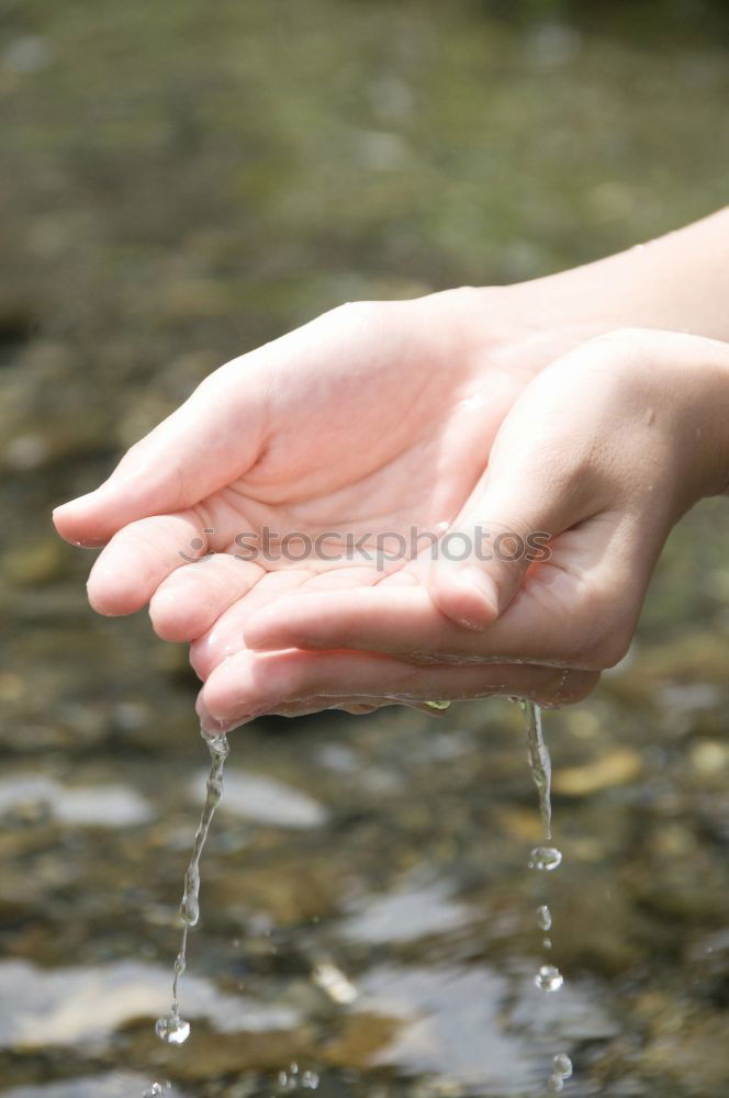 Similar – Image, Stock Photo Hand touching fresh water in a lake