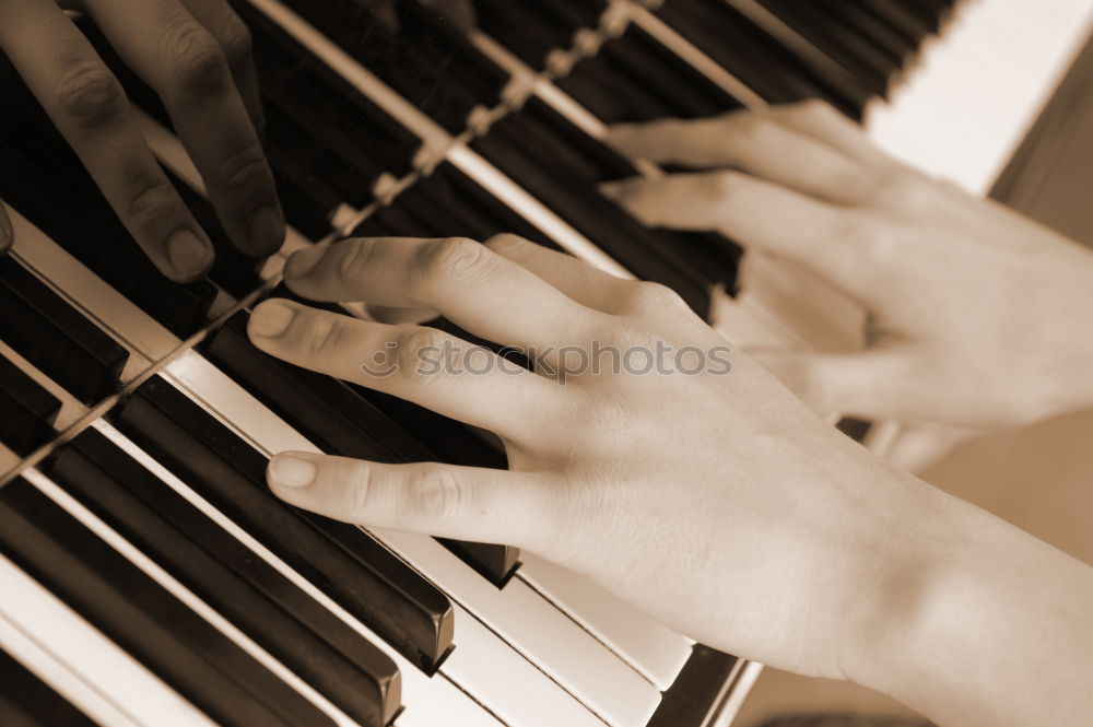 Similar – Image, Stock Photo Close up of hands of person playing piano