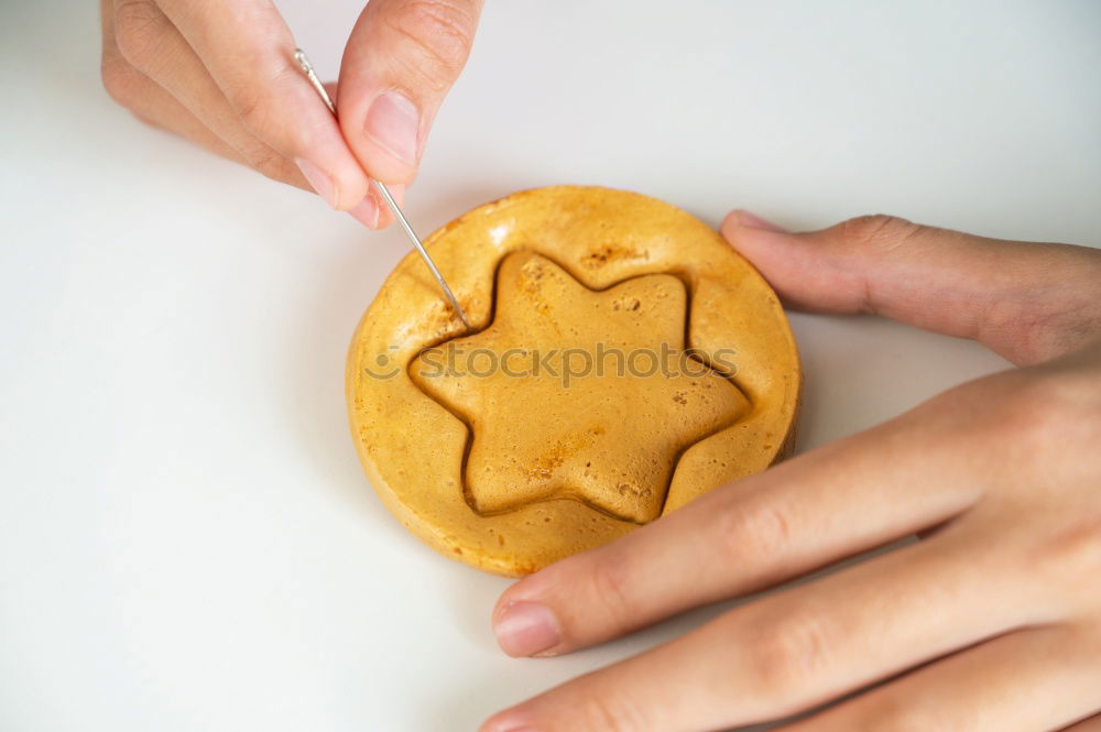 Similar – Image, Stock Photo Woman hands cutting a pumpkin pie. Purple background.