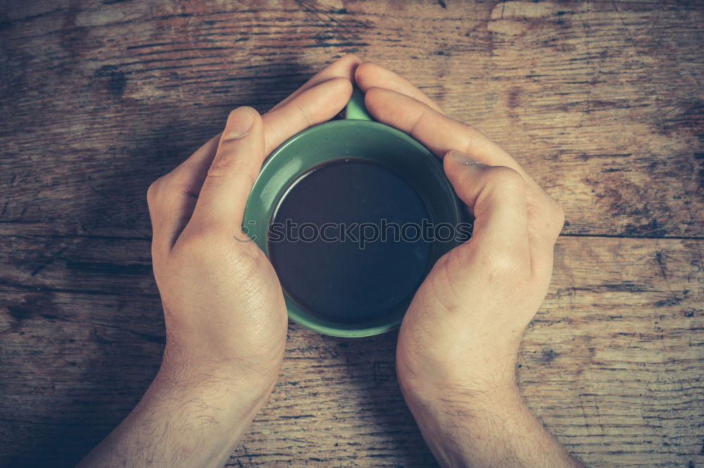 Similar – Image, Stock Photo Turquoise coffee mug held by hands of young woman in yellow pigtail sweater