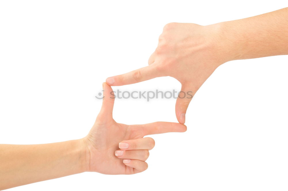 Similar – hands holding two oranges on gray background