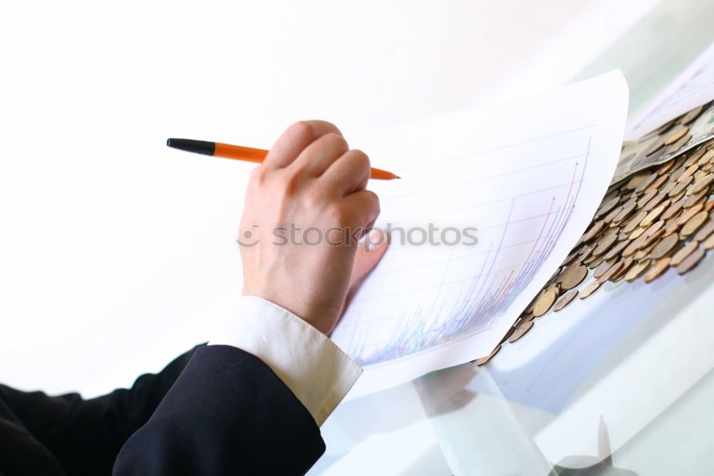 Similar – Image, Stock Photo Young architect working at home drawing plans