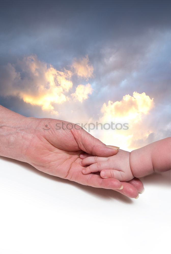 Similar – Baby girl, child and senior man comparing hands size