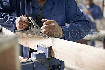 Similar – Professional carpenter at work.